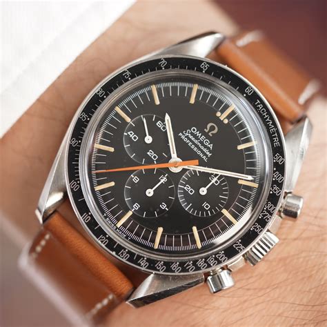 omega speedmaster orange hand